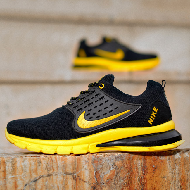 کفش مردانه Nike مدل Lixo مشکی زرد